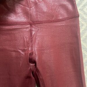 Lululemon wine colored special finish leggings. Size 4
